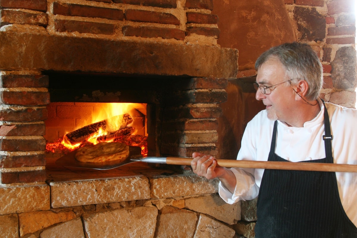 Shannon Kelly cooking Pizza at The Pizza Oven.